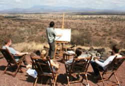 Artist Gregory Wellman demonstrates his techniques on location in Africa
